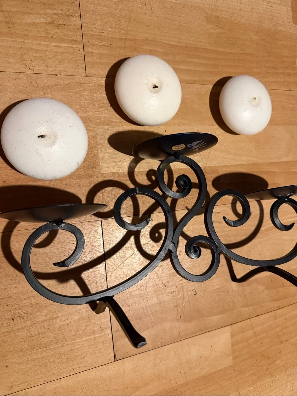 Decorative Black Scroll Metal Candle Holder with Cream Pillar Candles